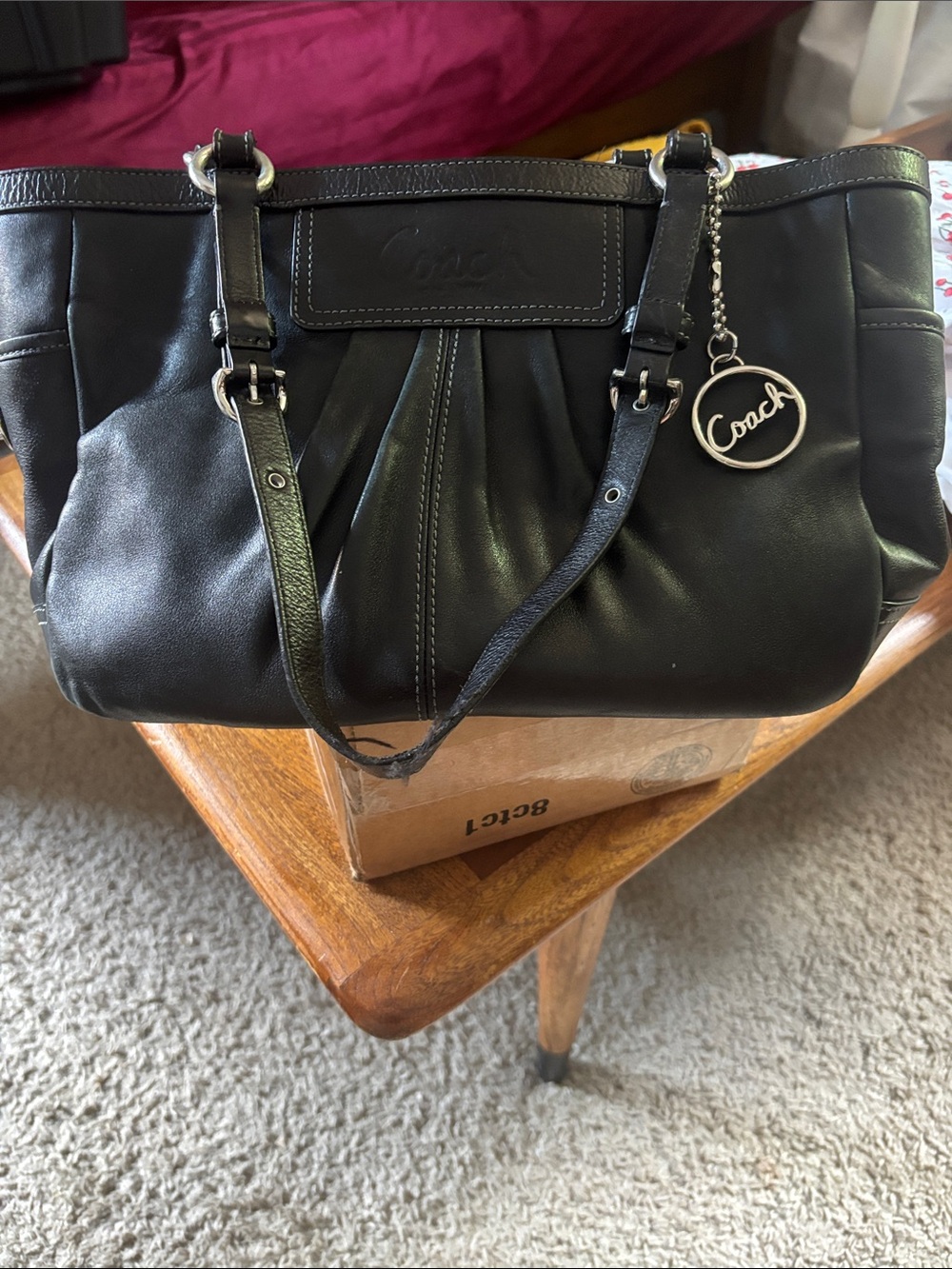 Coach Black Leather Shoulder Bag with Logo Charm